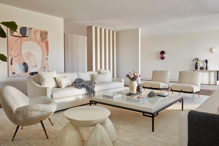 Large Area Rugs for a Stunning Living Room – A Design Journey Inspired by 5 Interior Icons