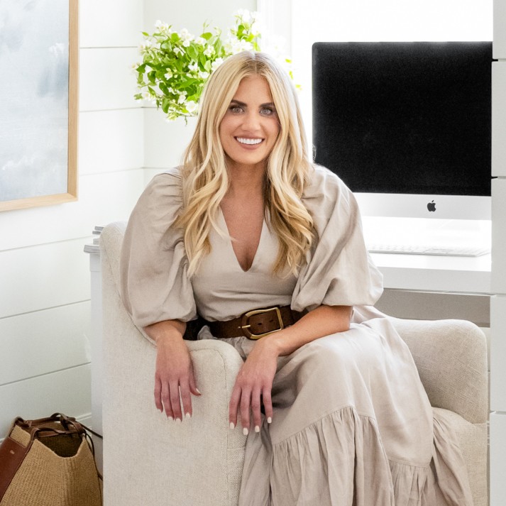Interior Designer Shea Mcgee Sitting Relaxed In A Sofa